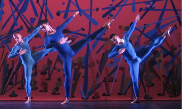 A couple of men dancing on stage

Description automatically generated